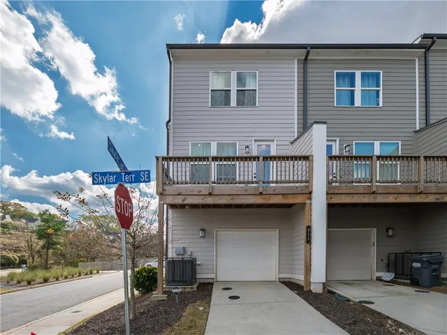 a front view of a house with a porch