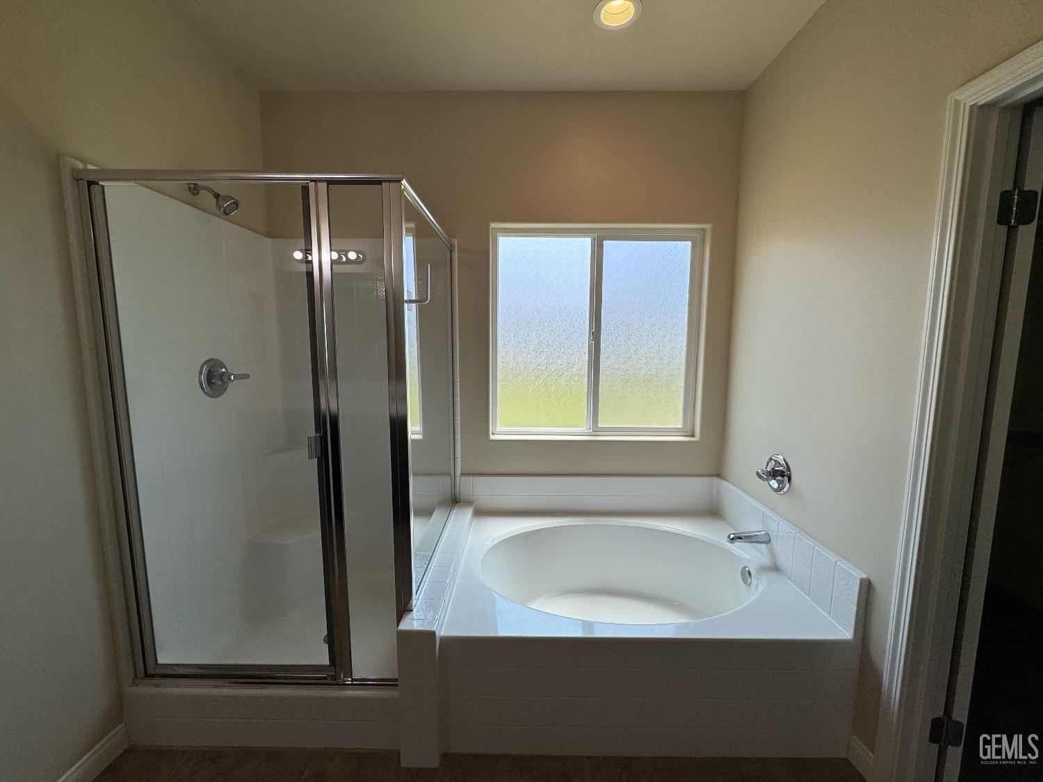 Undisclosed Address Bakersfield, CA 93313 - Photo 14 of 16 a bathroom with a sink and a mirror