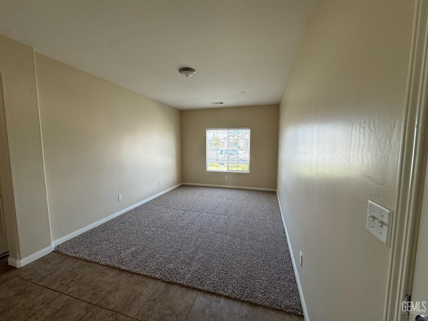 Undisclosed Address Bakersfield, CA 93313 - Photo 7 of 16 an empty room with windows