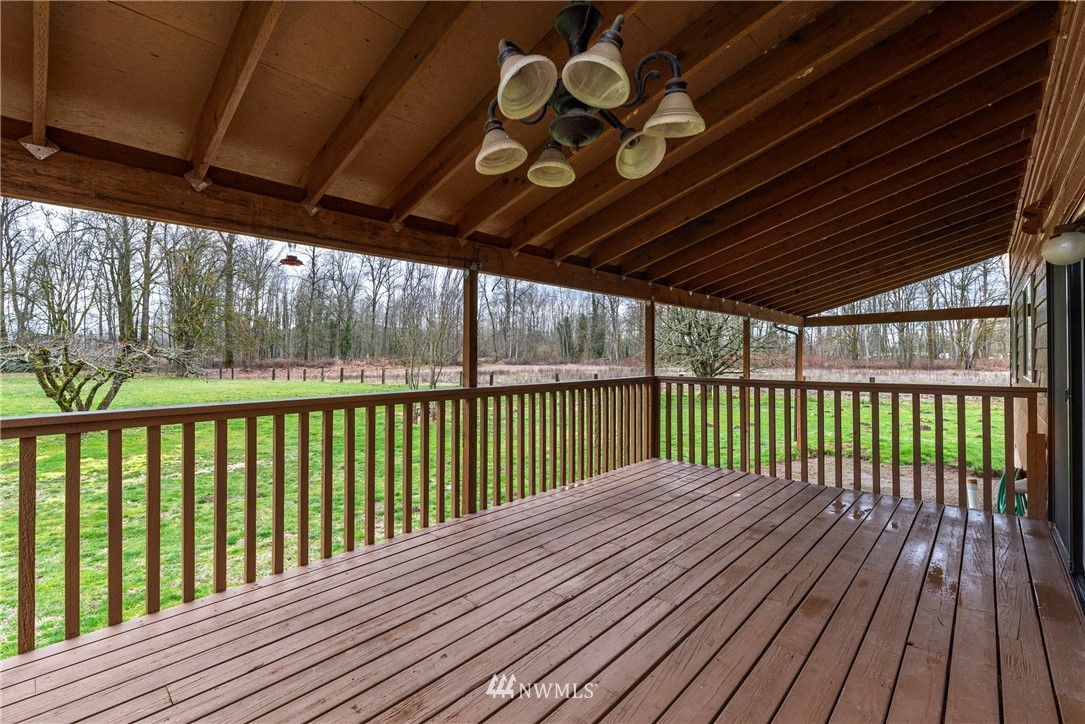 7456 Riverside Drive East Sumner, WA 98390 - Photo 20 of 40 a view of balcony with wooden floor