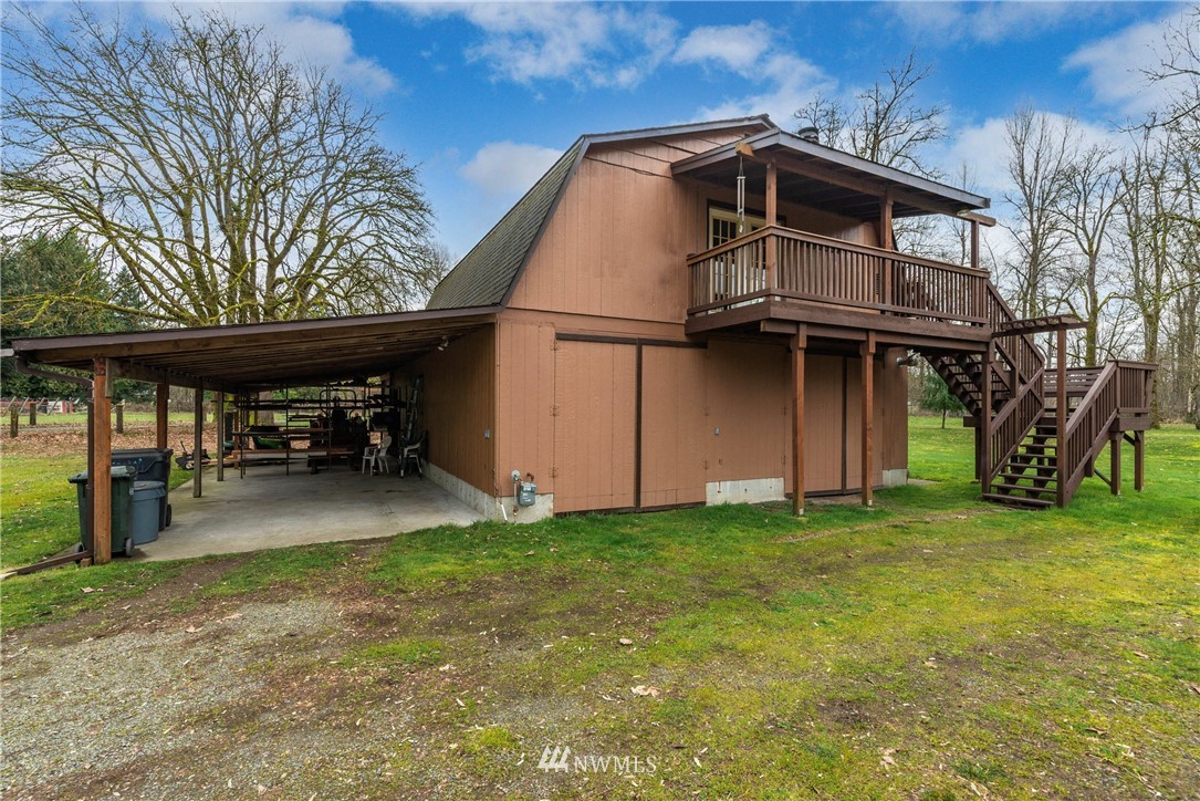 7456 Riverside Drive East Sumner, WA 98390 - Photo 23 of 40 a view of a back yard of the house