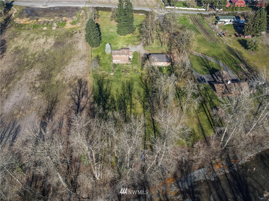 7456 Riverside Drive East Sumner, WA 98390 - Photo 39 of 40 a aerial view of residential houses with outdoor space