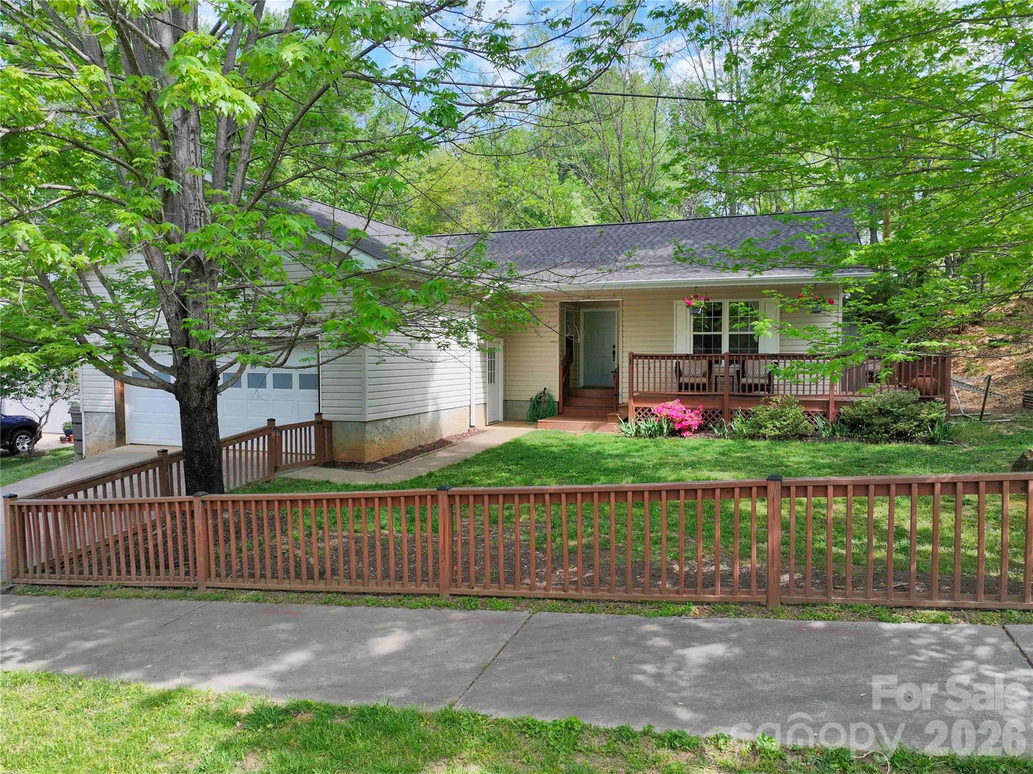 1 Mosers Place Candler, NC 28715 - Photo 1 of 32 front view of a house with a small yard