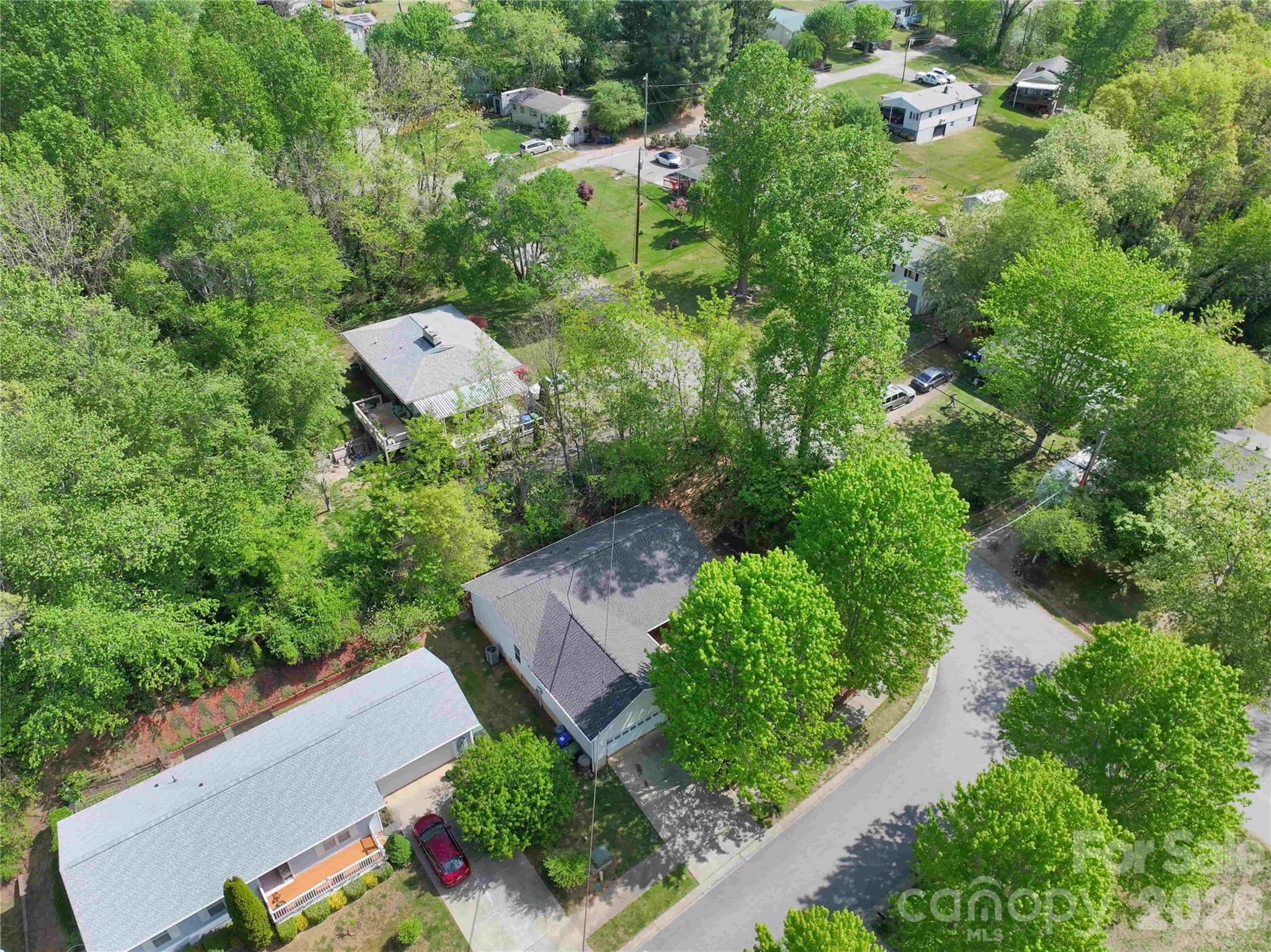 1 Mosers Place Candler, NC 28715 - Photo 25 of 32 an aerial view of a house with yard swimming pool and outdoor seating