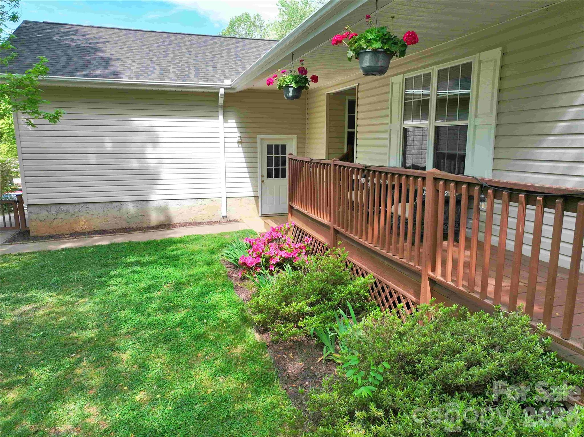 1 Mosers Place Candler, NC 28715 - Photo 3 of 32 a view of a house with wooden fence