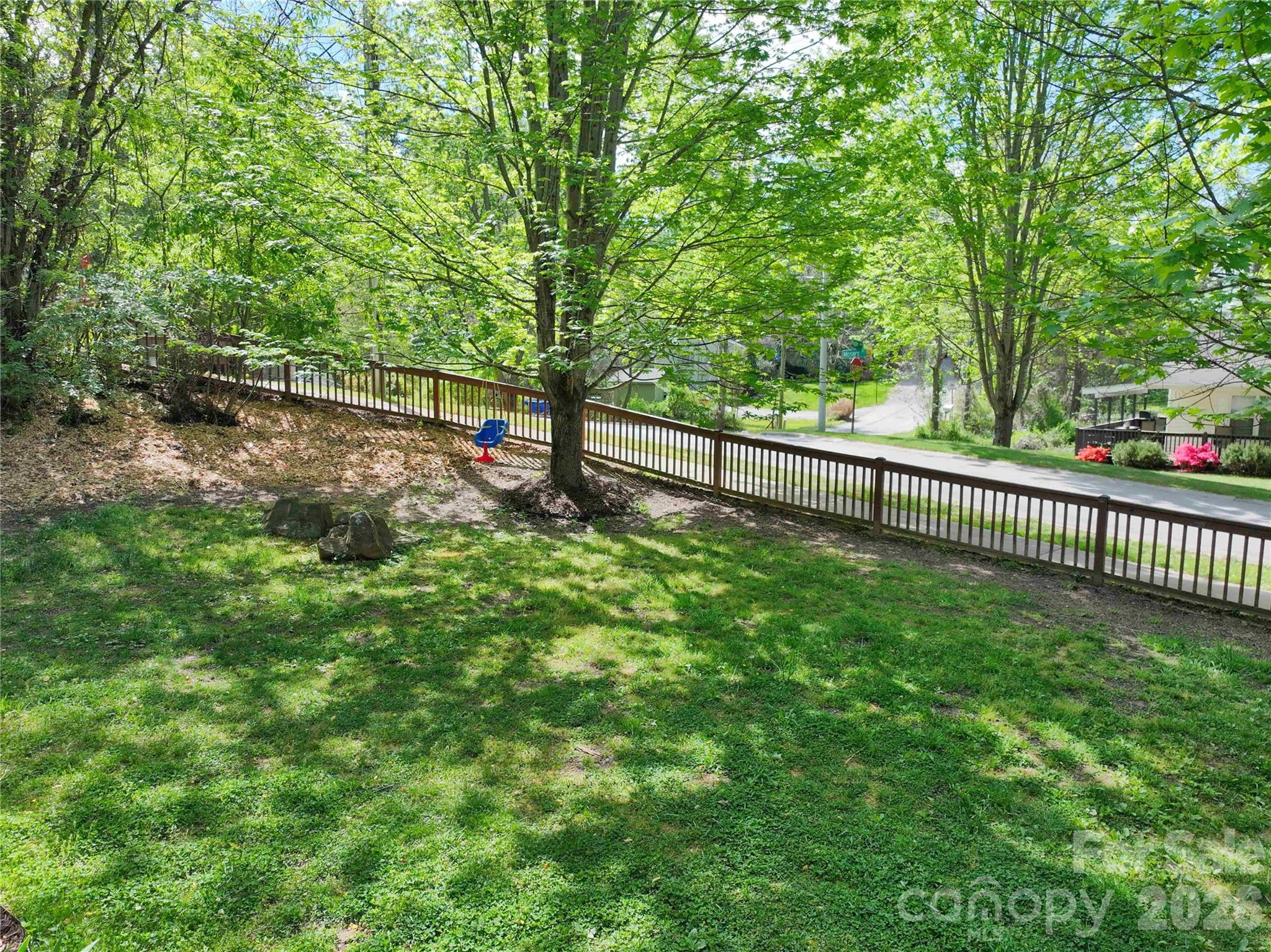 1 Mosers Place Candler, NC 28715 - Photo 31 of 32 a view of a backyard with a tree