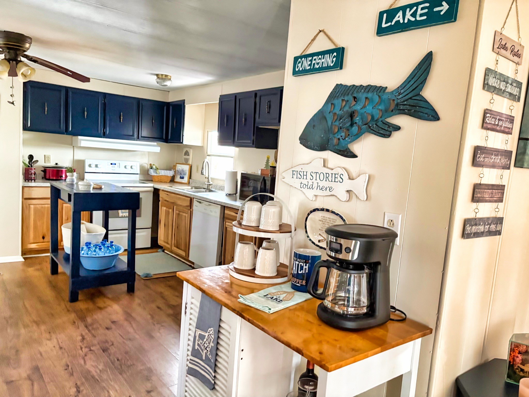 743 Brownfield Road Dover, TN 37058 - Photo 14 of 19 a kitchen with stainless steel appliances granite countertop a stove and a refrigerator
