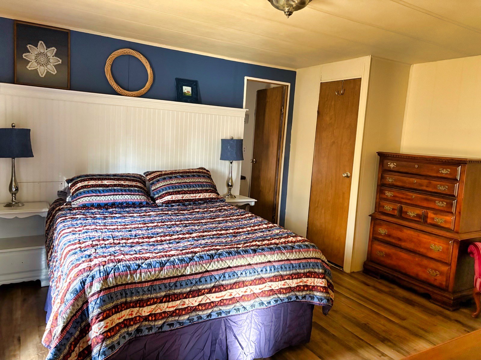 743 Brownfield Road Dover, TN 37058 - Photo 15 of 19 a bedroom with a bed and wooden floor