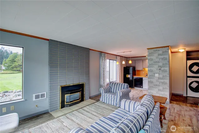 a bedroom with a bed and a fireplace