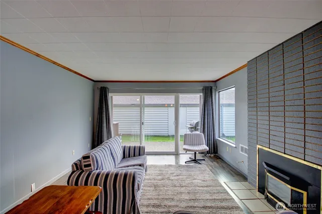 a living room with furniture and a table