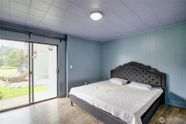 a room with furniture and a large window