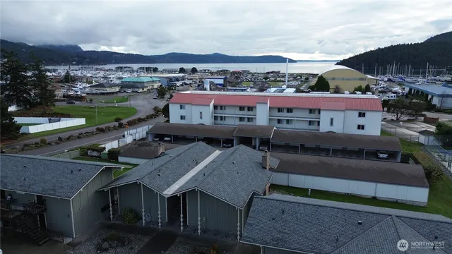 a view of a swimming pool with a yard