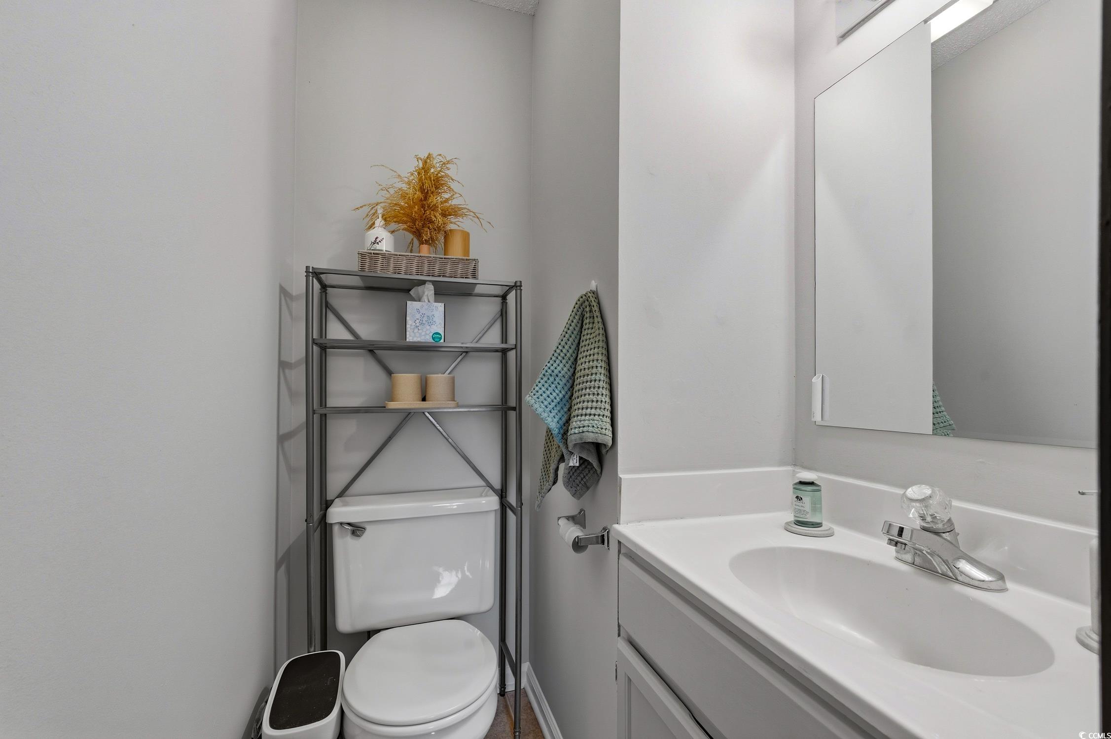 418 Chesterfield Court Myrtle Beach, SC 29577 - Photo 14 of 18 Bathroom featuring a shower with shower curtain and vanity