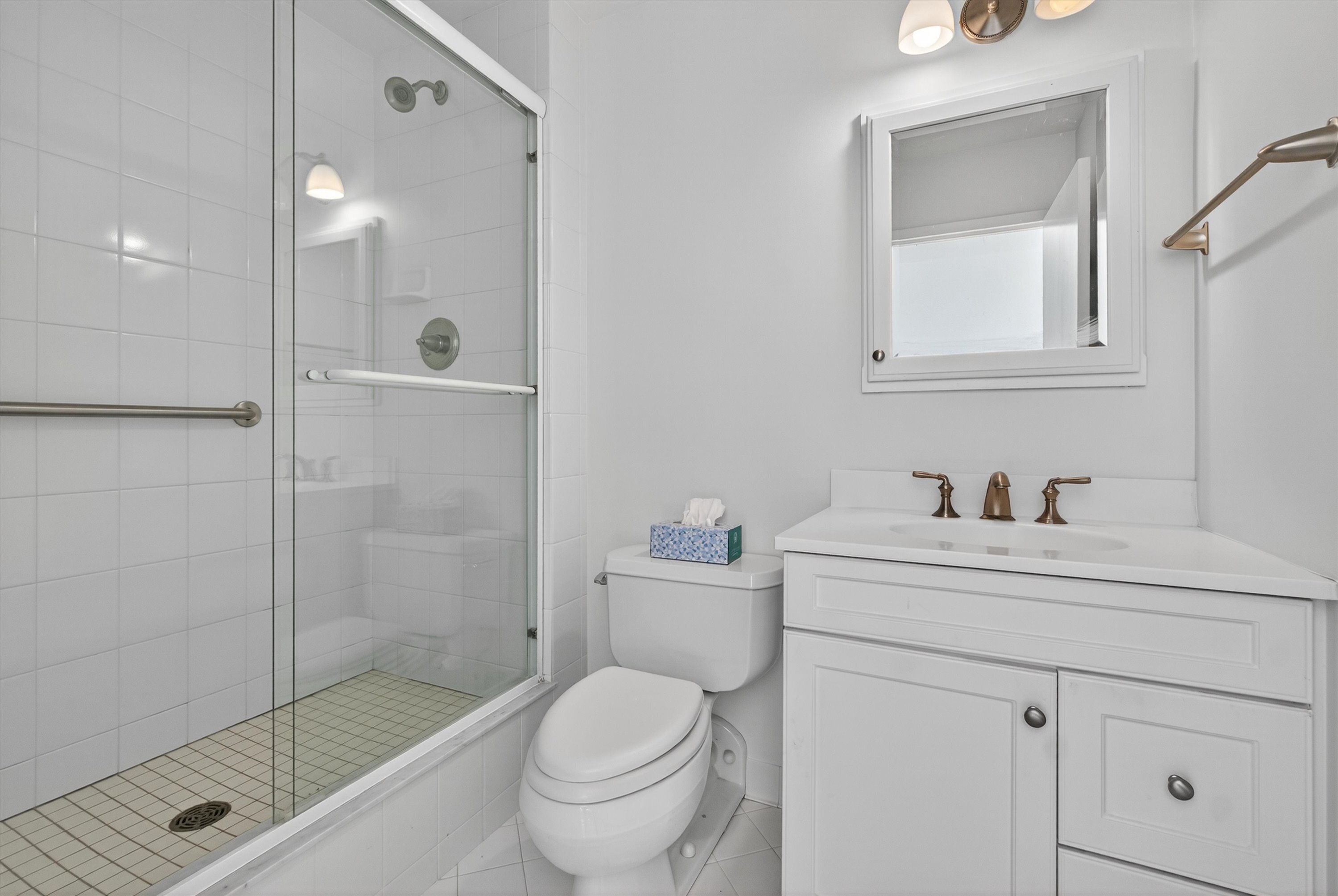 100 Seaview Avenue, Unit 3I Norwalk, CT 06855 - Photo 21 of 40 a bathroom with a sink a toilet and shower