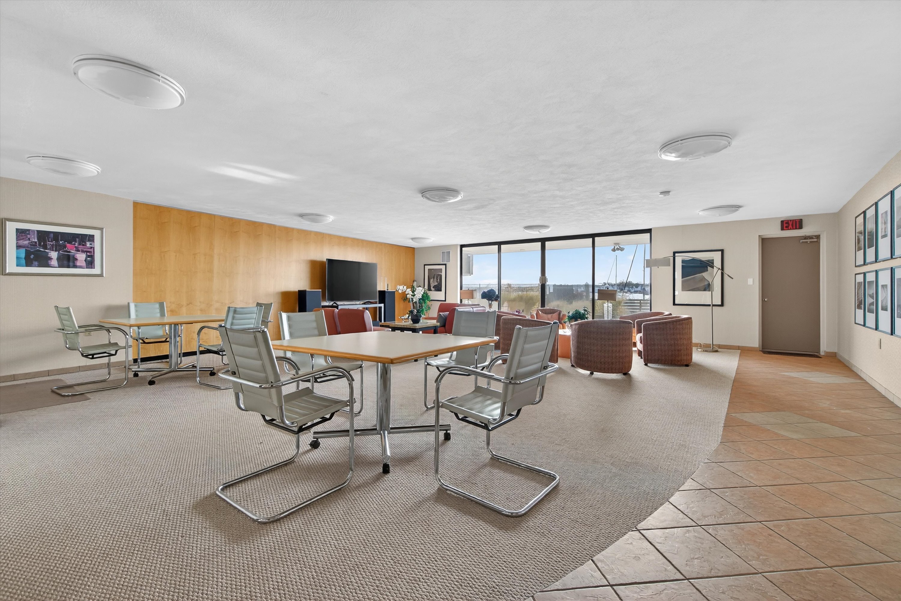 100 Seaview Avenue, Unit 3I Norwalk, CT 06855 - Photo 30 of 40 a living room with furniture a window and a table