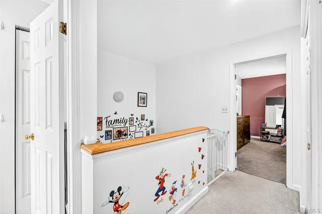 a room with a white cabinet and a sink
