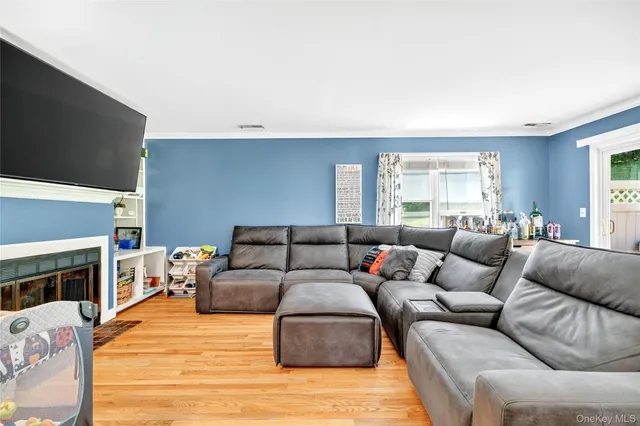 a living room with furniture a fireplace