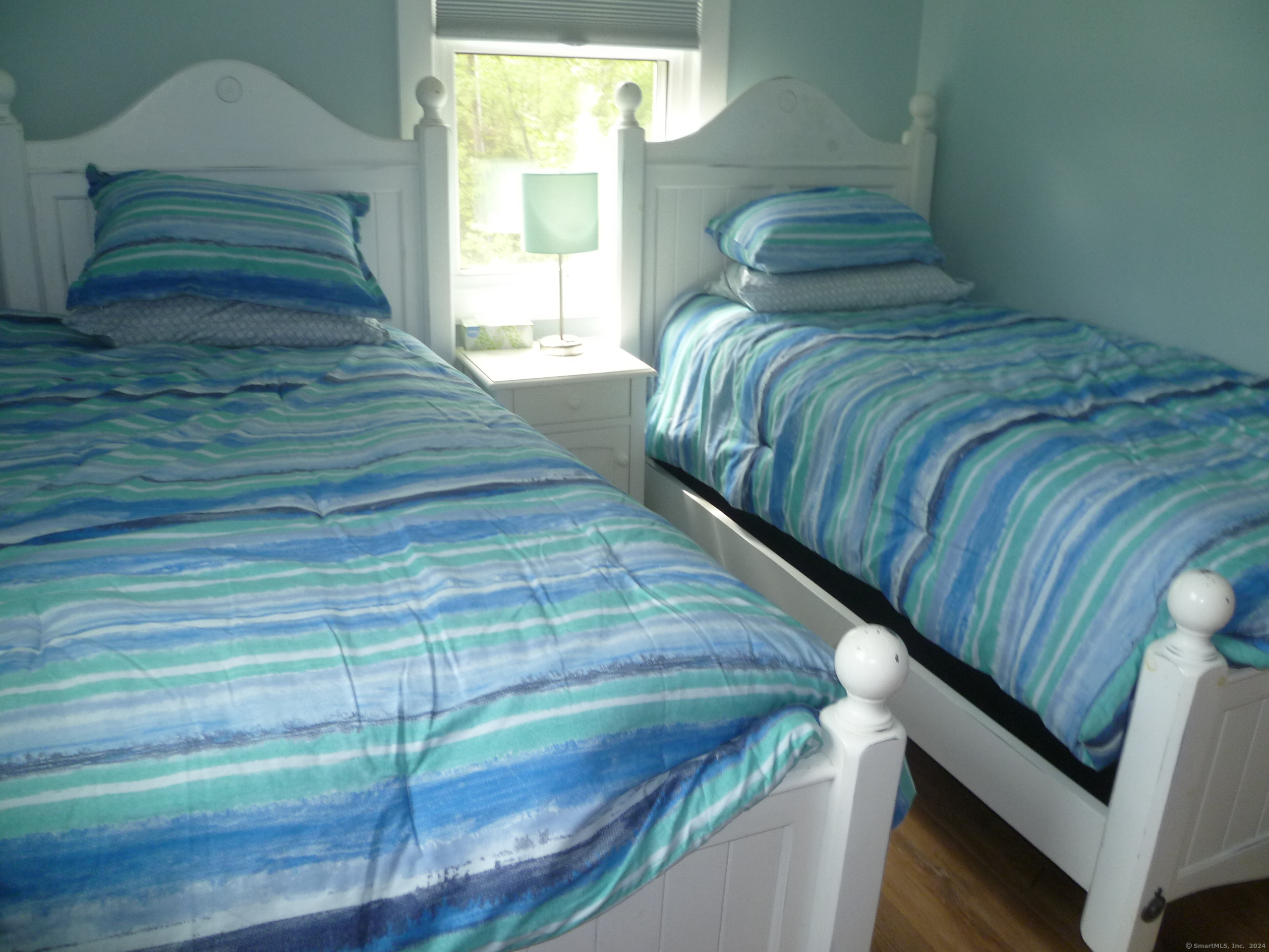 6 Sunset Lane Clinton, CT 06413 - Photo 16 of 27 a bedroom with a bed and a window
