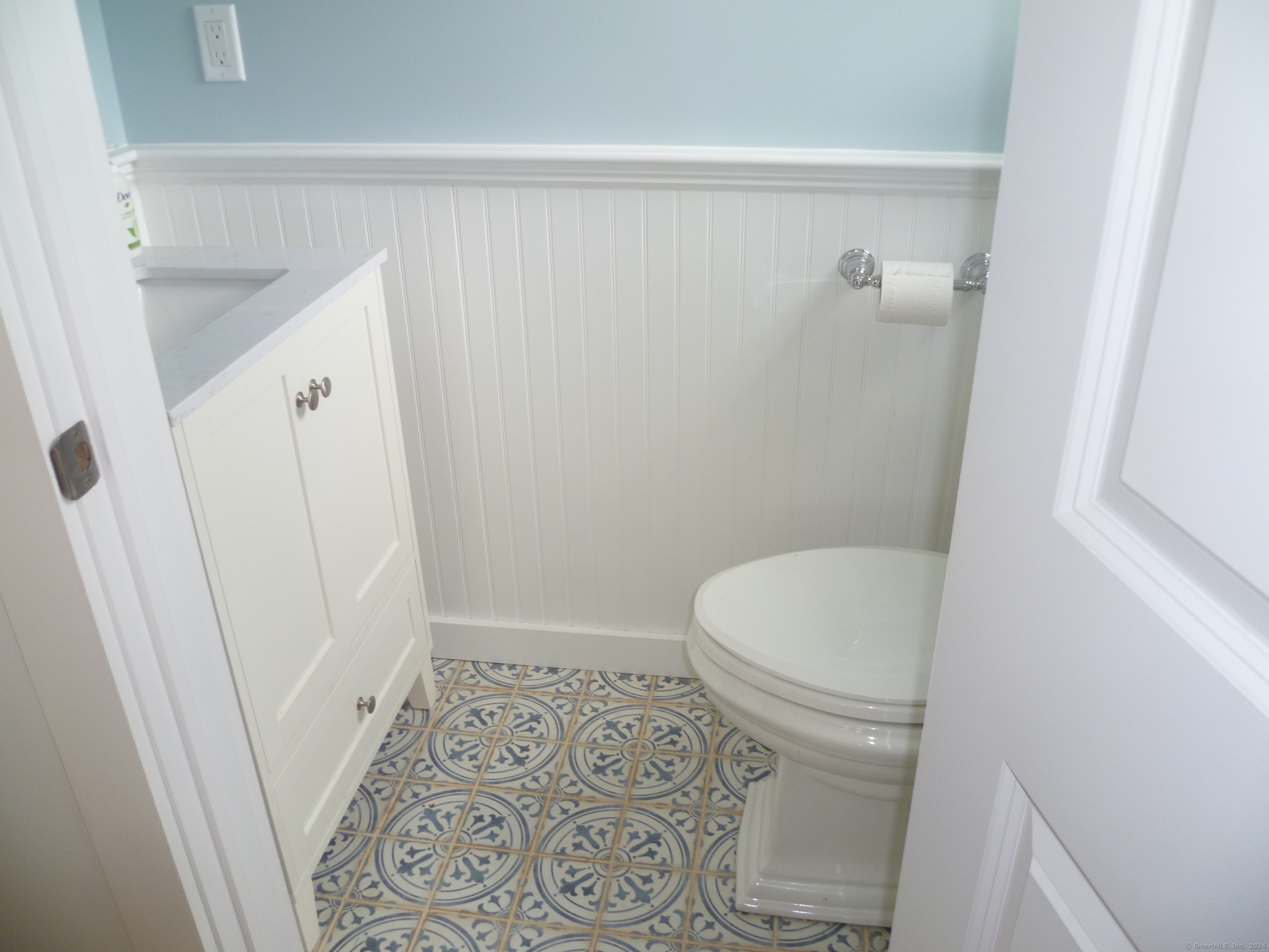 6 Sunset Lane Clinton, CT 06413 - Photo 23 of 27 a bathroom with a sink and a toilet