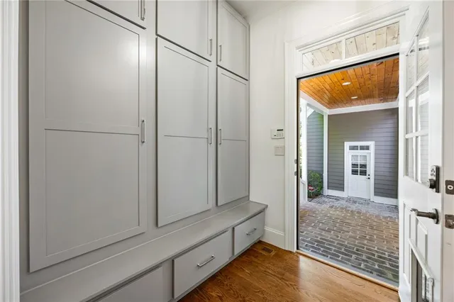 a view of a livingroom with a ceiling fan and window