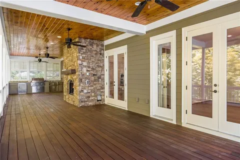a view of empty room with a fireplace