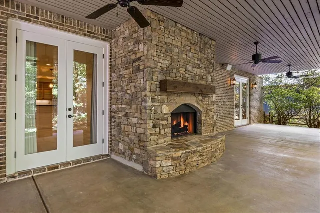 a view of a backyard with large trees