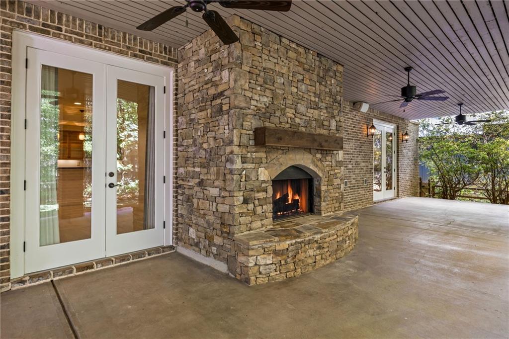 9179 Selborne Lane Chattahoochee Hills, GA 30268 - Photo 43 of 53 a view of empty room with a fireplace