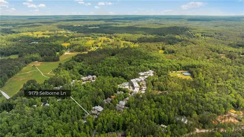 a view of an ocean and a yard