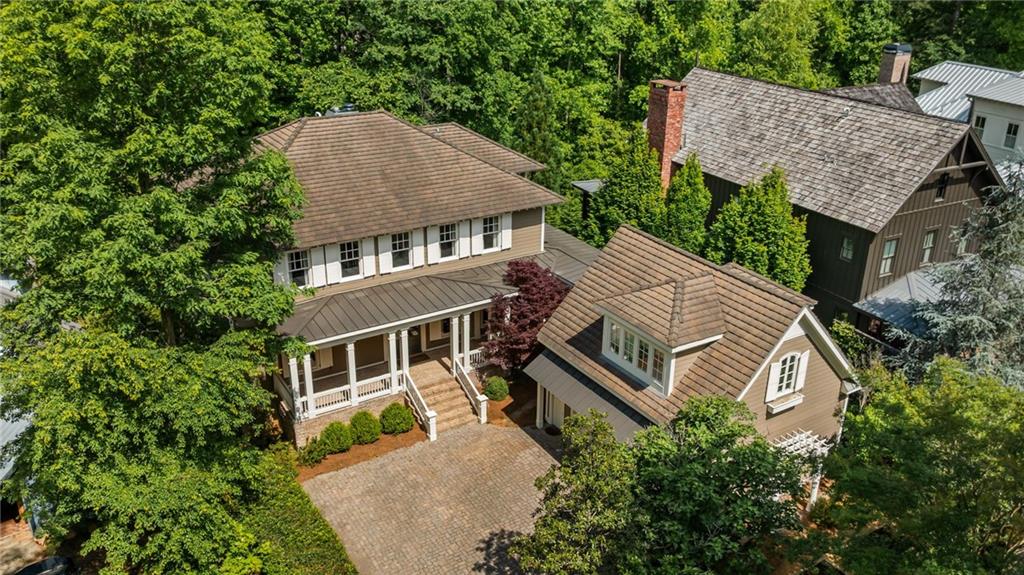 9179 Selborne Lane Chattahoochee Hills, GA 30268 - Photo 53 of 53 an aerial view of a house with a yard and trees