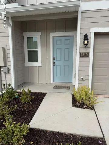 a view of a entryway door front of house