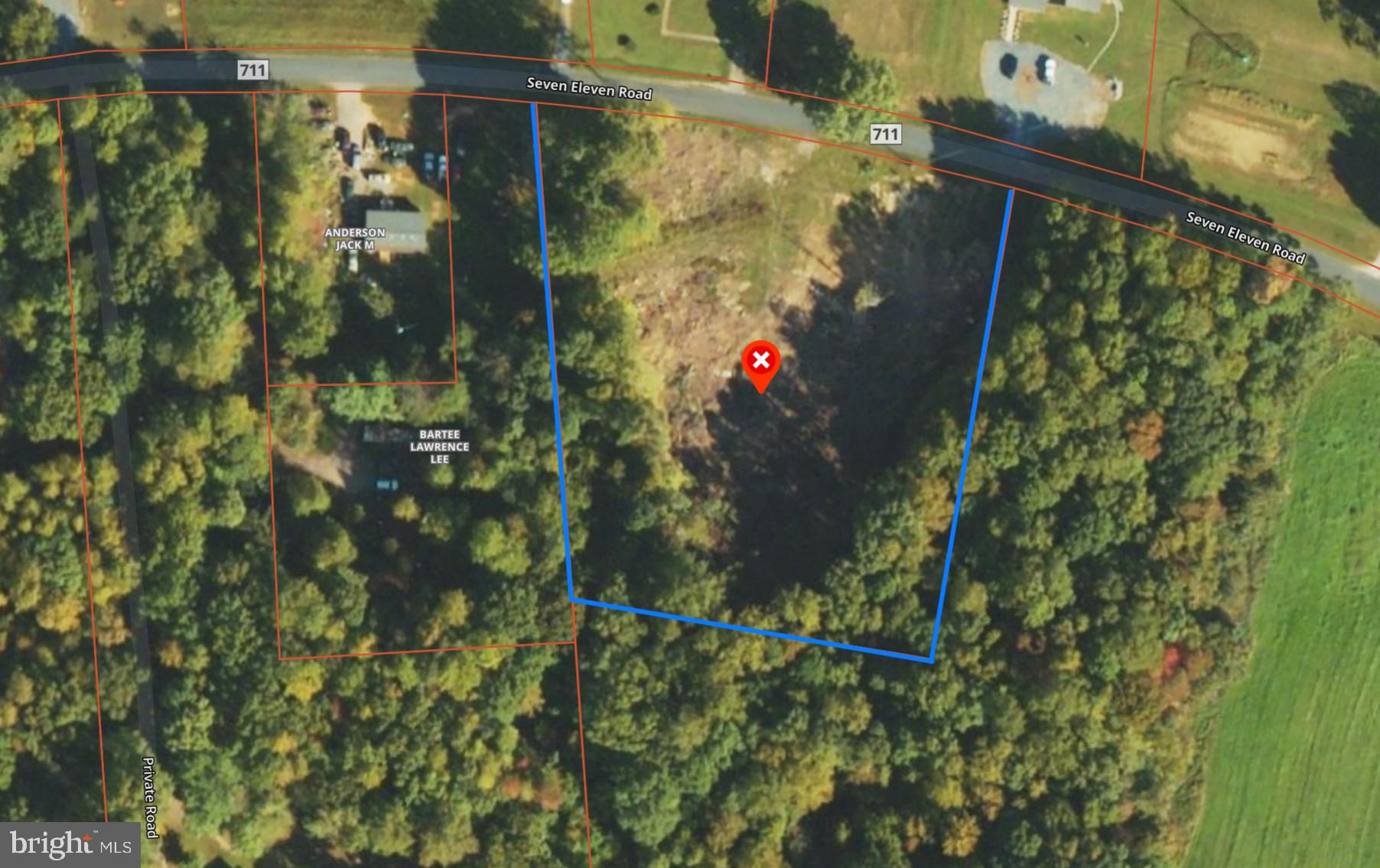 Scenic wooded lot for your dream home.