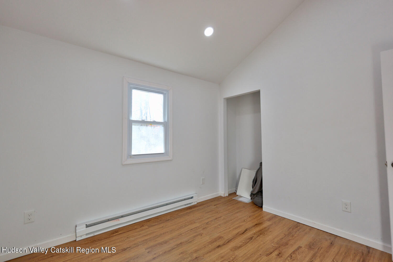 40 Cemetery Road Palenville, NY 12463 - Photo 23 of 47 an empty room with wooden floor and windows