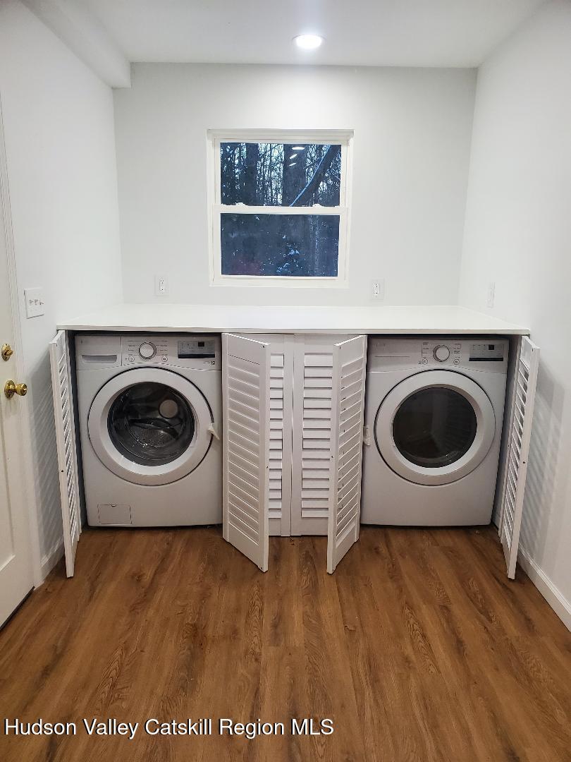 40 Cemetery Road Palenville, NY 12463 - Photo 27 of 47 a close view of a utility room with dryer and washer
