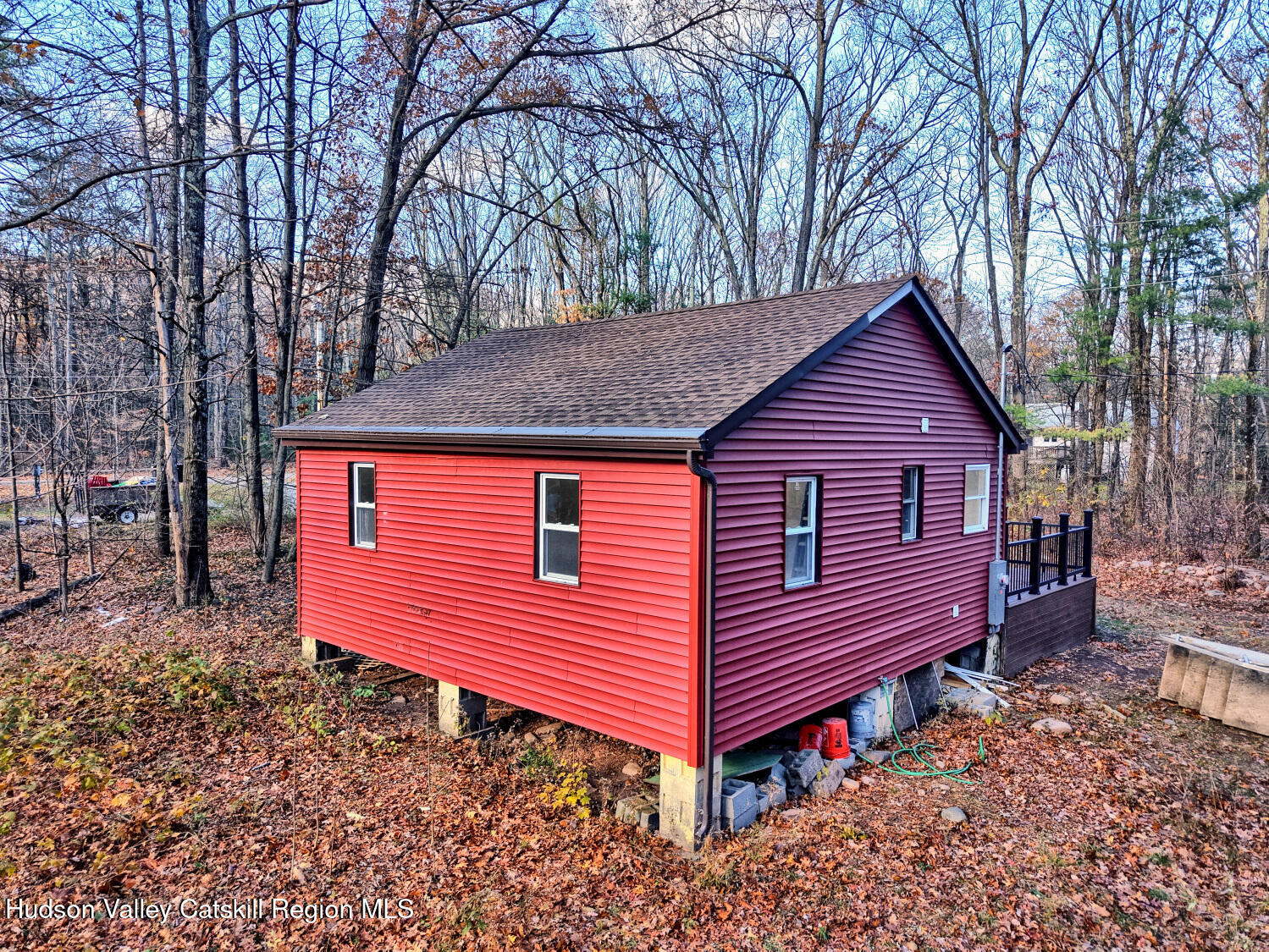 40 Cemetery Road Palenville, NY 12463 - Photo 33 of 47 a view of a house with a yard and wooden fence