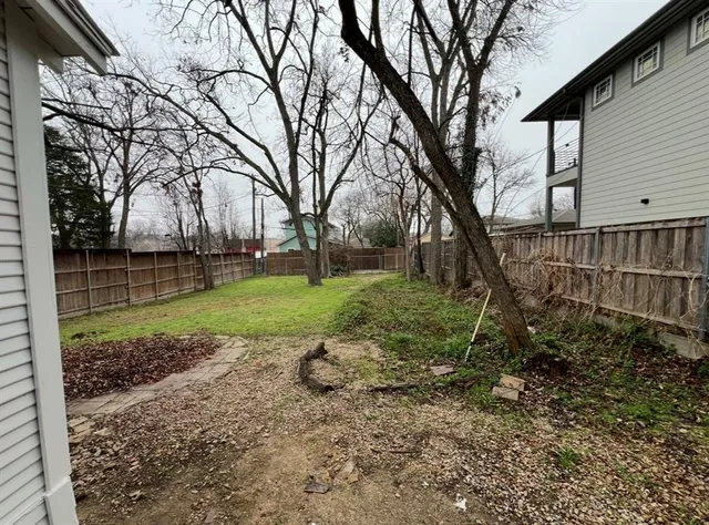 a view of a backyard with a garden