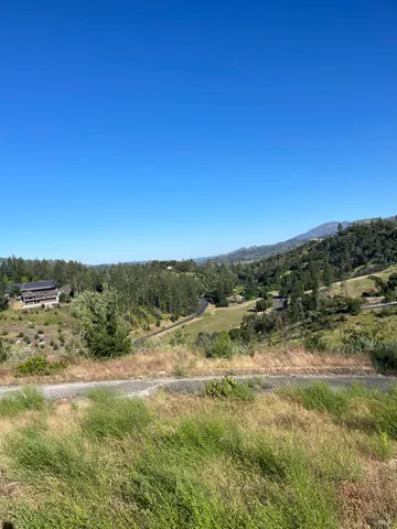 a view of a lake with a city