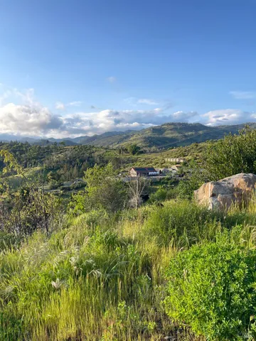 a view of an outdoor space and mountain view