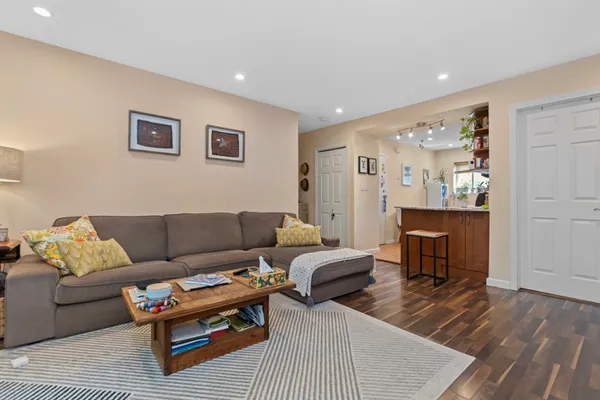 a living room with furniture and a table