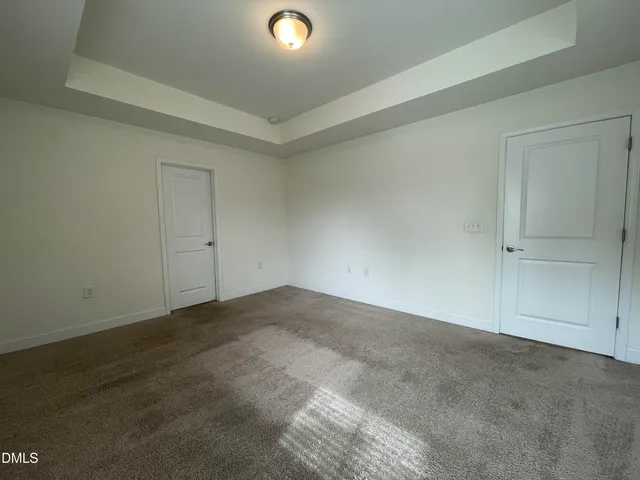 an empty room with a natural light