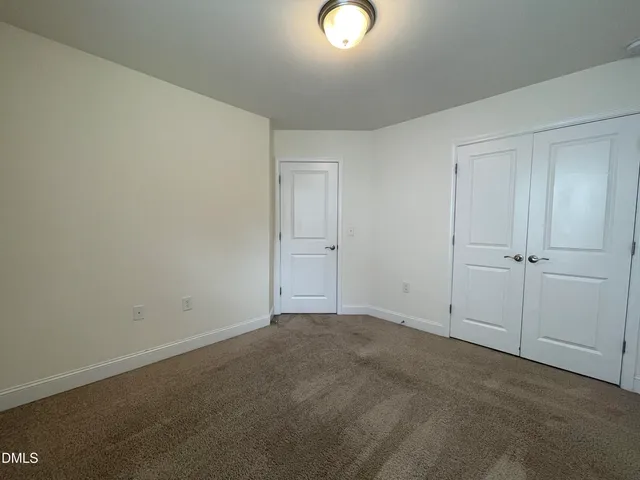 an empty room with window