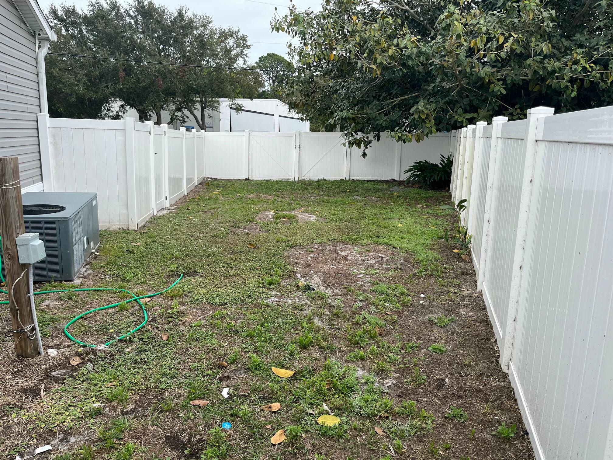 1580 Northeast Seneca Avenue Stuart, FL 34994 - Photo 18 of 19 Fenced Yard