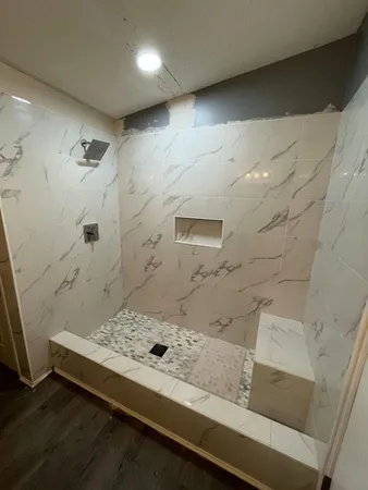 a bathroom with a sink and a shower