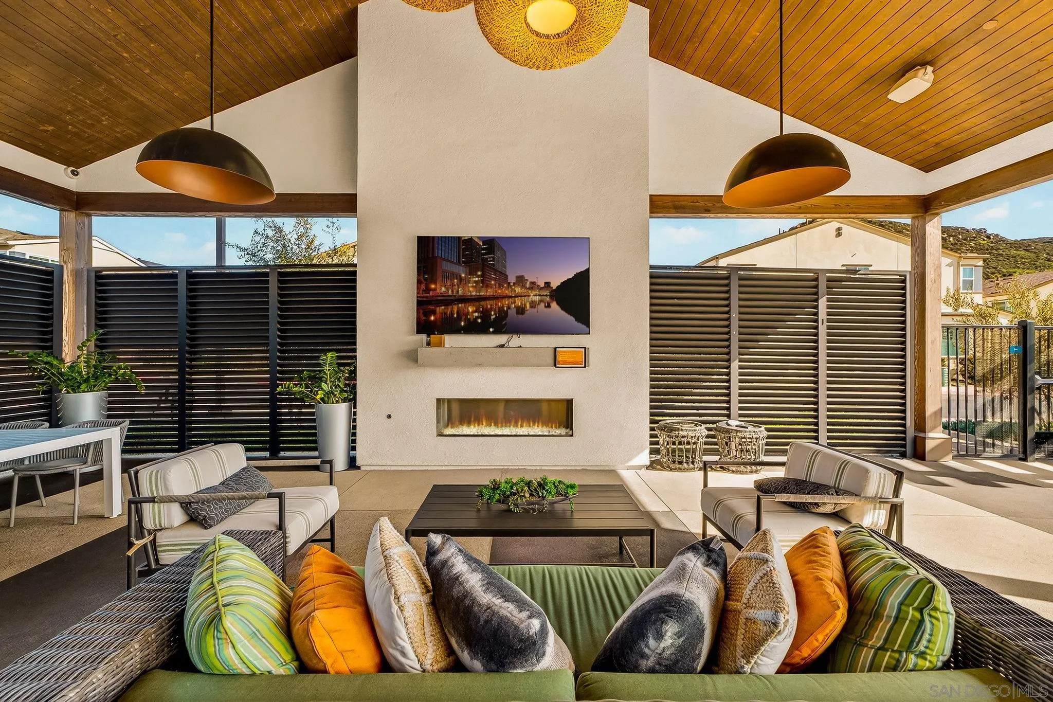 307 Seedling Way Fallbrook, CA 92028 - Photo 14 of 20 a living room with furniture a flat screen tv and a table