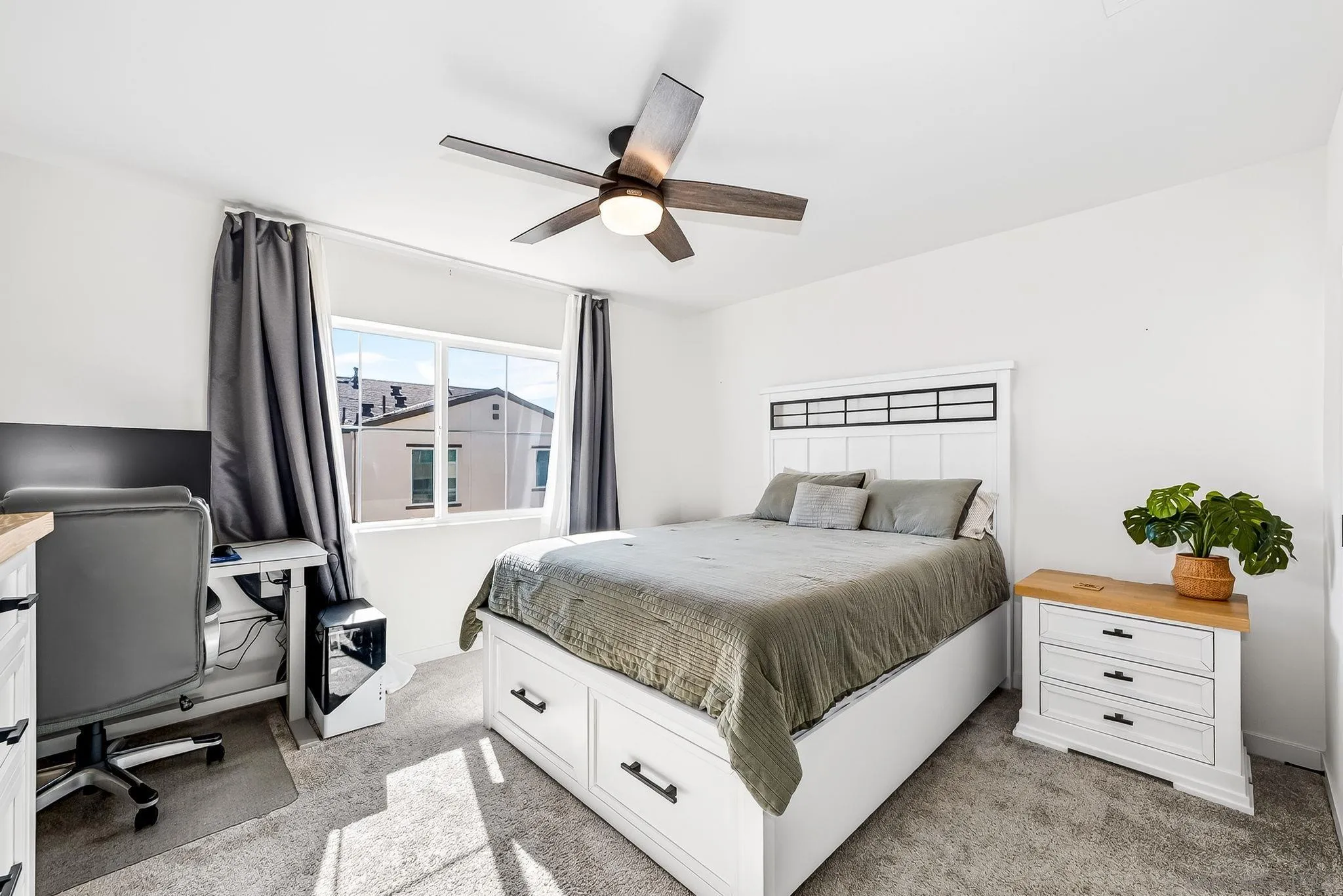 307 Seedling Way Fallbrook, CA 92028 - Photo 8 of 20 a bedroom with a bed and a chandelier