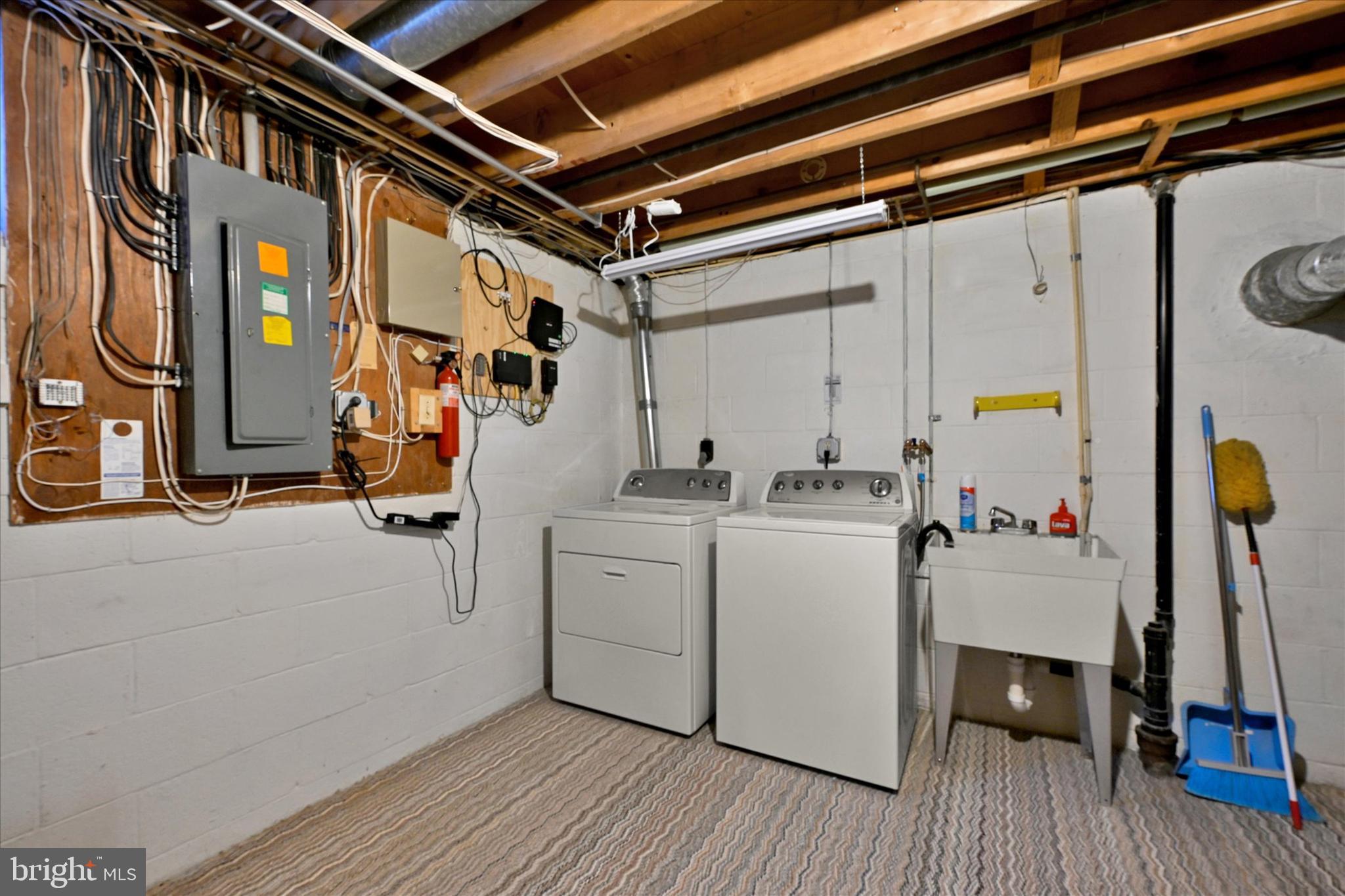 4009 Eland Road Phoenix, MD 21131 - Photo 30 of 38 a storage room with wooden floor and furniture