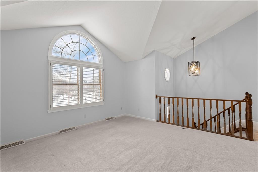 2765 Dutch Ridge Road Beaver, PA 15009 - Photo 3 of 27 an empty room with windows ceiling fan and windows