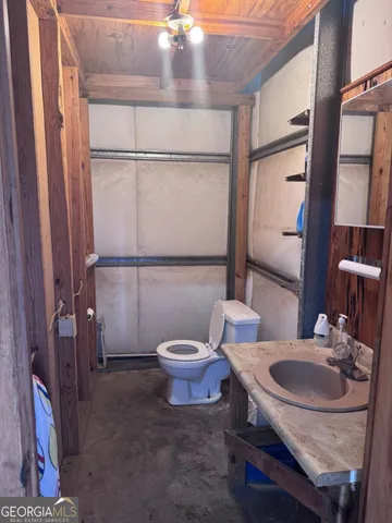 a view of a swimming pool with a yard