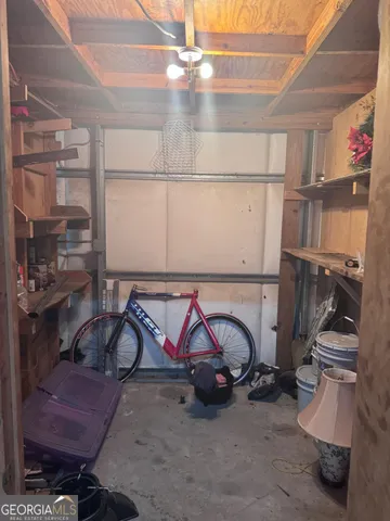 a swimming pool with outdoor seating and yard