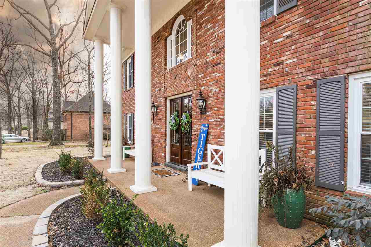 1211 Frank Road Collierville, TN 38017 - Photo 2 of 23 Enjoy your morning and evenings sitting quietly on this beautiful front porch.