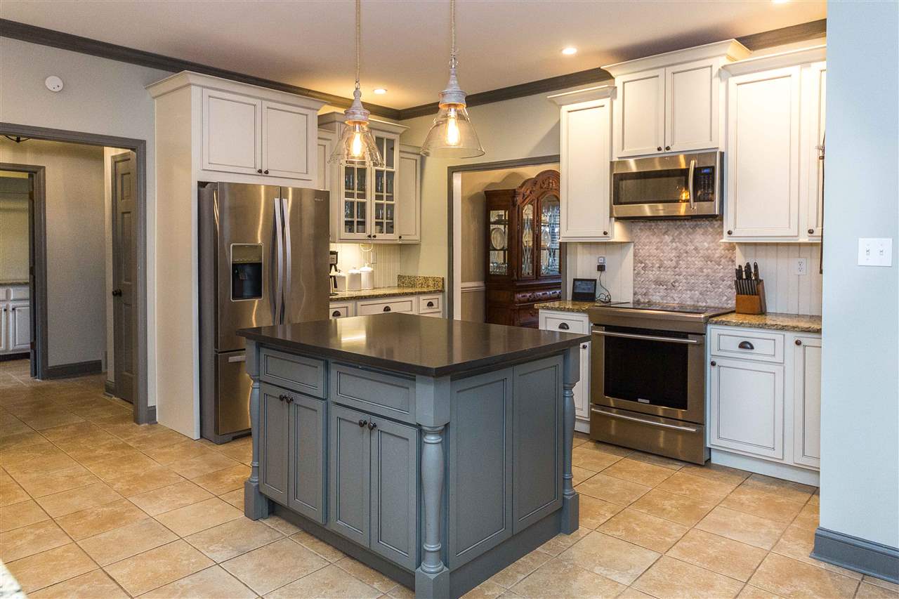 1211 Frank Road Collierville, TN 38017 - Photo 8 of 23 Beautiful island in kitchen is a nice accent for this estate home.